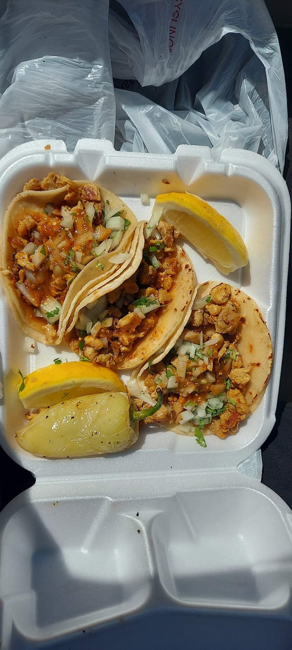 Printed menu with lunch combinations and mariscos.