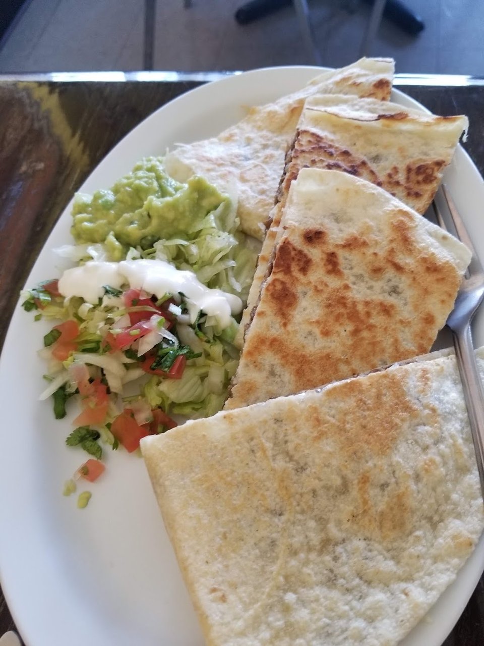 Mexican menu featuring seafood and breakfast items.