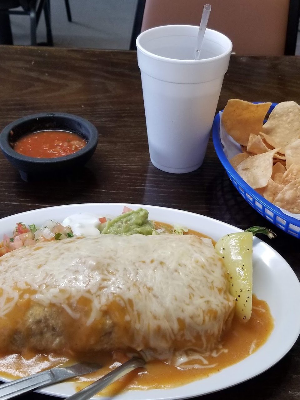 Restaurant menu showing salads, tortas, and tacos.