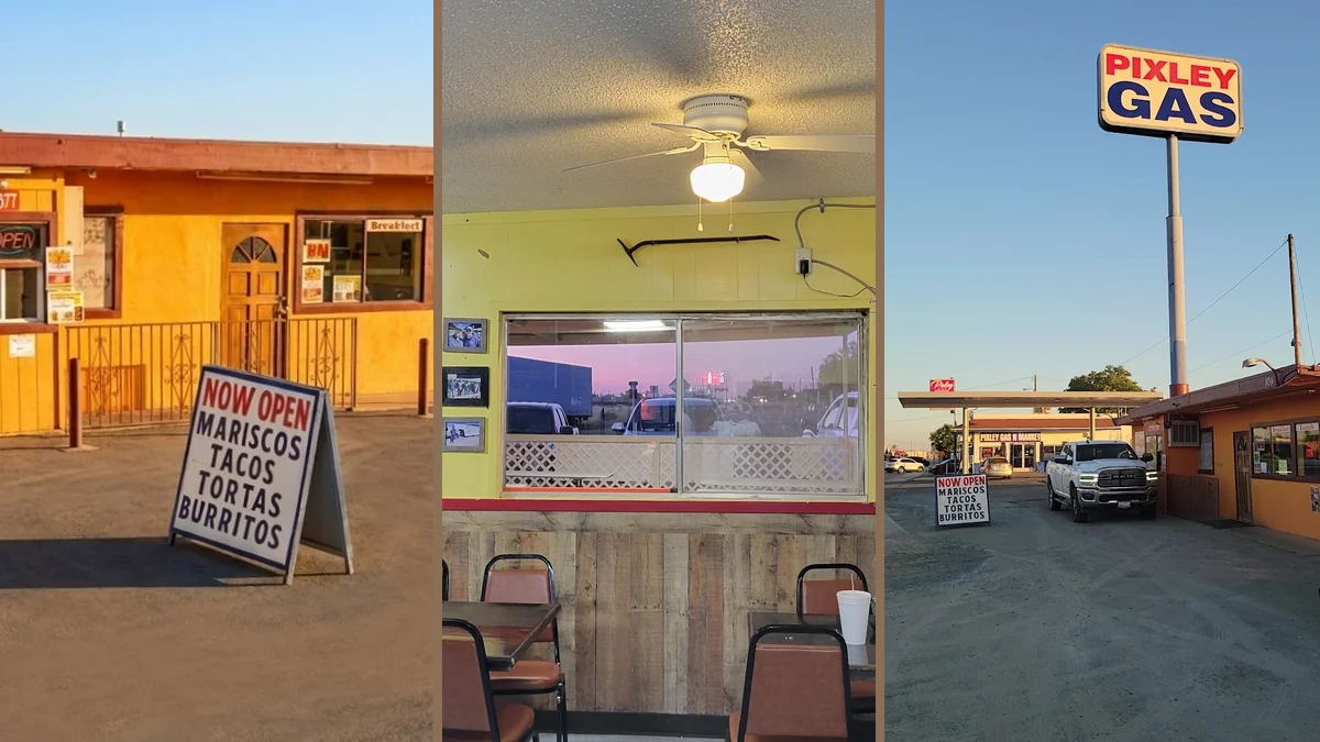 Outdoor seating beside a Main Street storefront.
